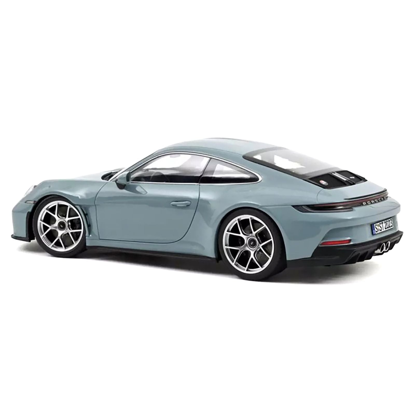 Blue sports car from the side.
