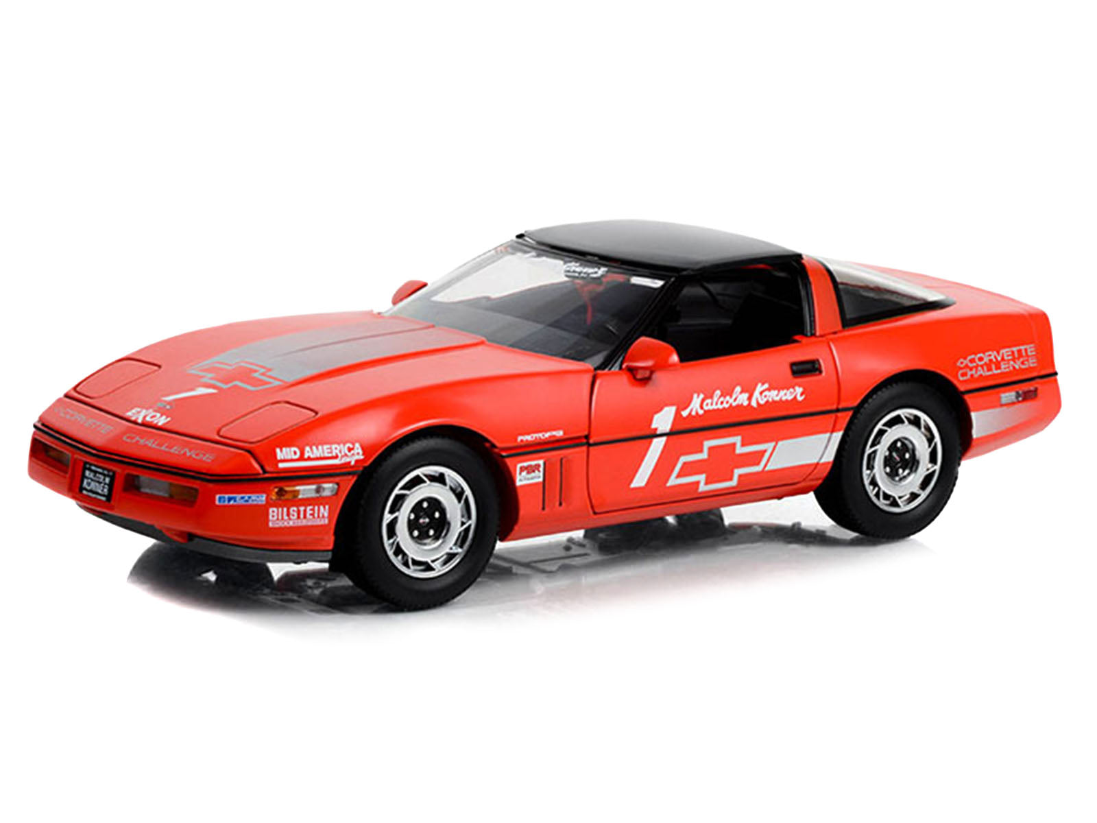 Red Chevrolet Corvette race car.