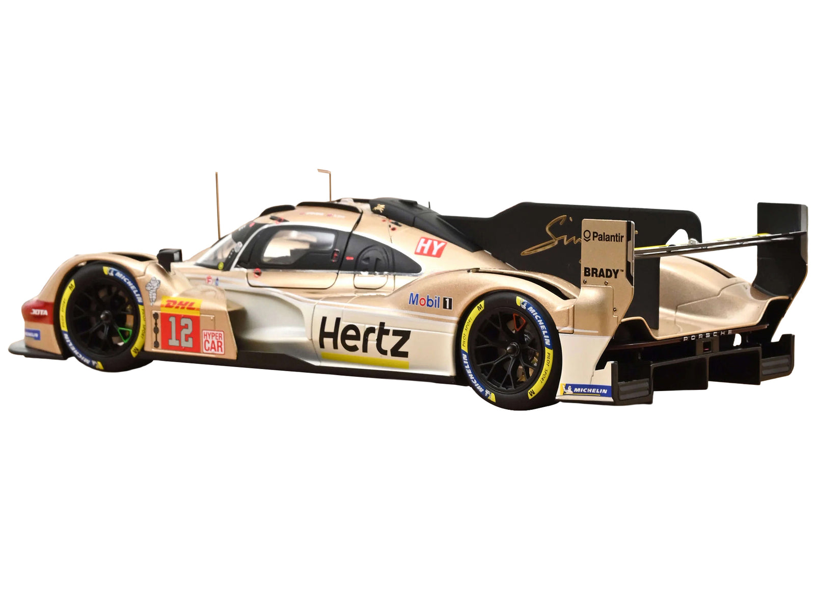 Race car with sponsor logos, side view.