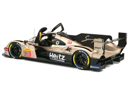 Gold and black race car with open doors.