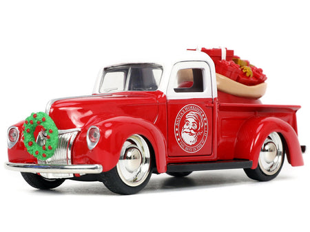 1941 Ford Pickup Truck Red and White "Santa's Workshop" and 1957 Chevrolet Bel Air Red Metallic and White "Express 25" with Mr. and Mrs. Santa Claus Diecast Figures "Holiday Rides" Series 1/32 Diecast Model Cars by Jada-Jada-ModelCars.com