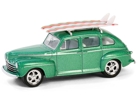 1946 Ford Fordor Super Deluxe Green Metallic with White Interior and Roof Rack with Surfboards "The Hobby Shop" Series 16 1/64 Diecast Model Car by Greenlight-Greenlight-ModelCars.com