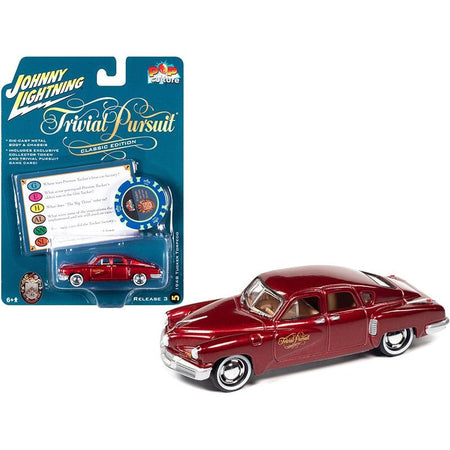 1948 Tucker Torpedo Red Maroon Metallic "Tucker: The Man and His Dream" (1988) Movie with Poker Chip (Collector Token) and Game Card "Trivial Pursuit" "Pop Culture" Series 3 1/64 Diecast Model Car by Johnny Lightning - Johnny Lightning - ModelCars.com