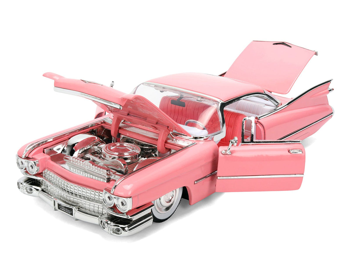 1959 Cadillac Coupe DeVille Pink with Pink and White Interior "Showroom Floor" Series 1/24 Diecast Model Car by Jada-Jada-ModelCars.com