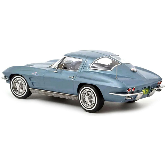1963 Chevrolet Corvette Stingray Light Blue Metallic 1/18 Diecast Model Car by Norev - Norev - ModelCars.com