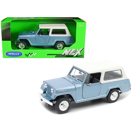 1967 Jeep Jeepster Commando Station Wagon Light Blue Metallic with White Top "NEX Models" Series 1/24 Diecast Model Car by Welly - Welly - ModelCars.com