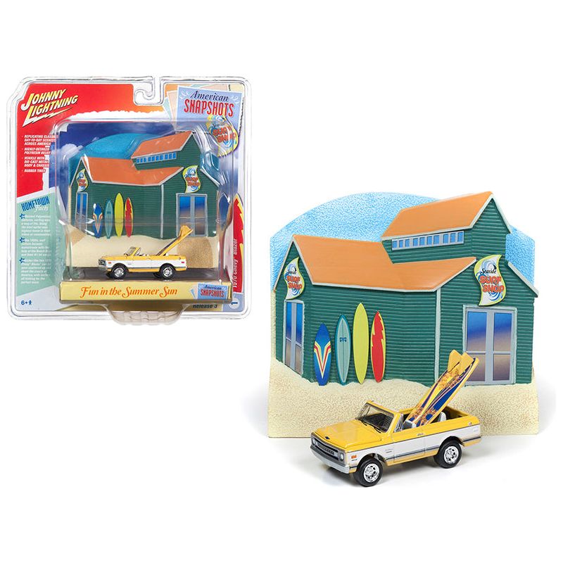 1970 Chevrolet Blazer Convertible Pickup Truck Yellow and White with Surf Boards and "Surf Shop" Front Facade Diorama Set "American Snapshots" 1/64 Diecast Model Car by Johnny Lightning-Johnny Lightning-ModelCars.com