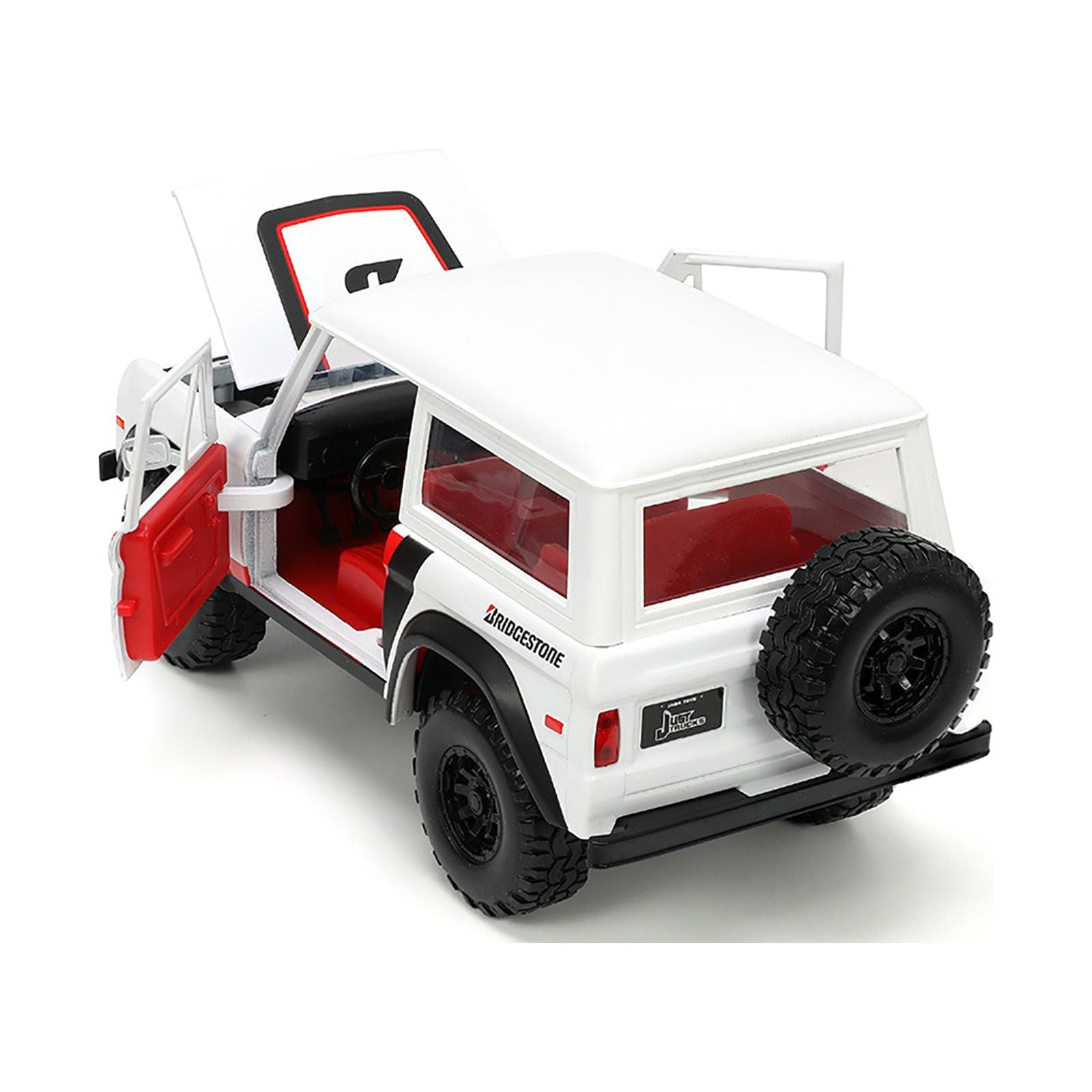 1973 Ford Bronco 008 White with Red and Black Stripes and Red Interior with Extra Wheels "Just Trucks" Series 1/24 Diecast Model Car by Jada - Jada - ModelCars.com