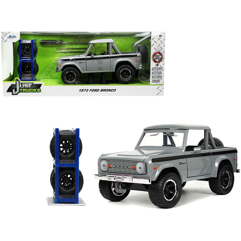1973 Ford Bronco Pickup Truck Gray with Black Stripes with Extra Wheels "Just Trucks" Series 1/24 Diecast Model Car by Jada - Jada - ModelCars.com