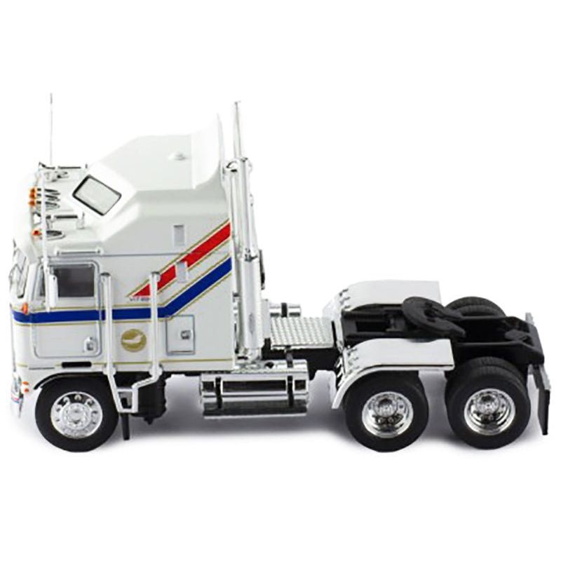 1976 Kenworth K100 Aerodyne Truck Tractor White with Blue and Red Stripes 1/64 Diecast Model by IXO Models - IXO - ModelCars.com