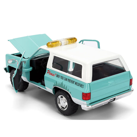 1980 Chevrolet Blazer Light Green with White Top and Graphics and Smokey Bear Diecast Figure "Smokey Bear" "Hollywood Rides" Series 1/24 Diecast Model by Jada-Jada-ModelCars.com