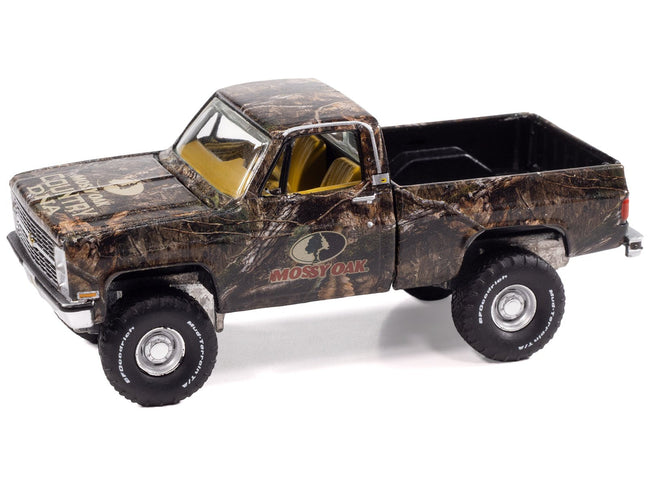 1983 Chevrolet Silverado Pickup Truck "Mossy Oak" Camouflage Livery "Big Country Collectibles" 2025 Series 1/64 Diecast Model Car by Auto World-Autoworld-ModelCars.com