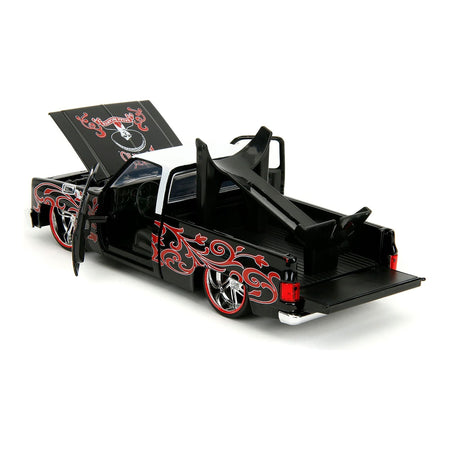1985 Chevrolet C-10 Pickup Truck Black with White Top and Graphics with Charro Man Diecast Figure "Tapatio" 1/24 Diecast Model Car by Jada-Jada-ModelCars.com