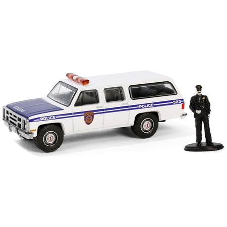 1985 GMC Suburban 2500 "New York City Transit Police Department" White with Blue Stripes and Police Officer Figure "The Hobby Shop" Series 16 1/64 Diecast Model Car by Greenlight-Greenlight-ModelCars.com