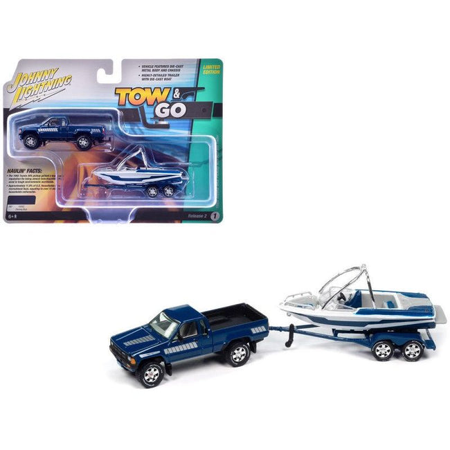 1985 Toyota SR5 Pickup Truck Dark Blue with Graphics and Boat with Trailer Limited Edition "Tow & Go" Series 1/64 Diecast Model Car by Johnny Lightning - Johnny Lightning - ModelCars.com