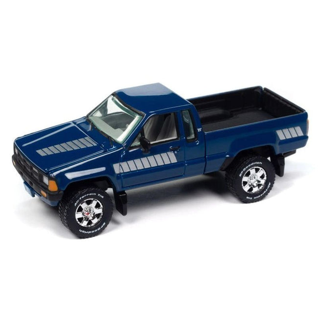 1985 Toyota SR5 Pickup Truck Dark Blue with Graphics and Boat with Trailer Limited Edition "Tow & Go" Series 1/64 Diecast Model Car by Johnny Lightning - Johnny Lightning - ModelCars.com