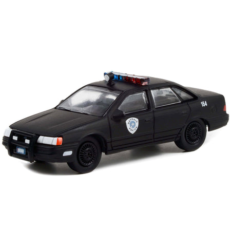 1986 Ford Taurus LX Matt Black "Detroit Police" "RoboCop" (1987) Movie "Hollywood Series" Release 34 1/64 Diecast Model Car by Greenlight - Greenlight - ModelCars.com