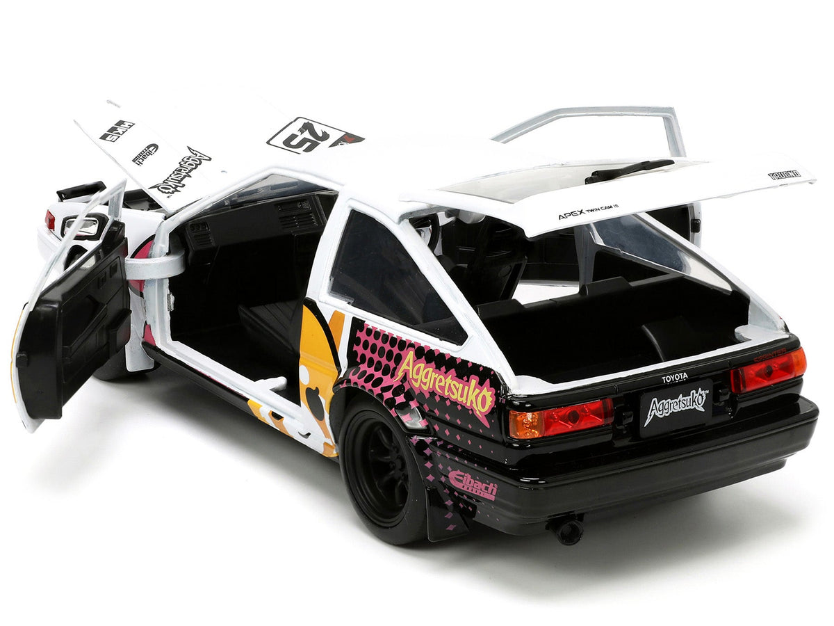 1986 Toyota Trueno (AE86) RHD (Right Hand Drive) 25 White with Graphics and Aggretsuko Diecast Figure "Aggretsuko" "Anime Hollywood Rides" Series 1/24 Diecast Model Car by Jada-Jada-ModelCars.com