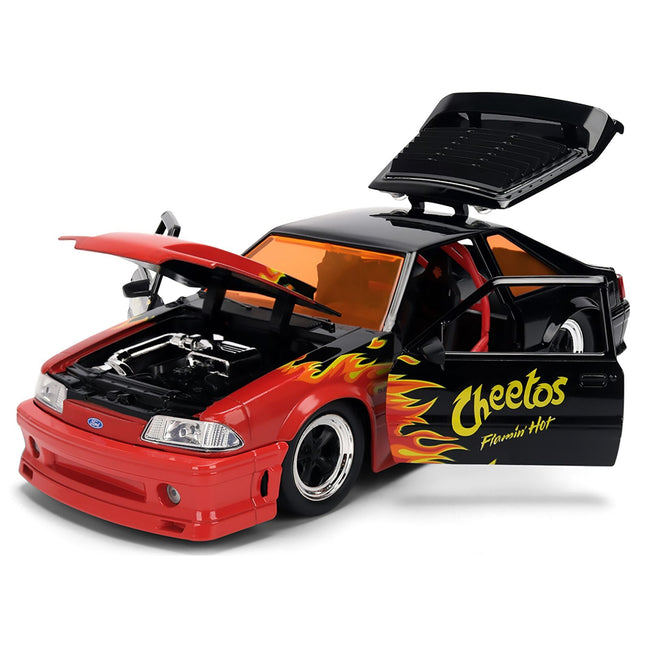1989 Ford Mustang GT Black with Red Flame Graphics and Chester Cheetah Diecast Figure "Cheetos Flamin' Hot" "Hollywood Rides" Series 1/24 Diecast Model Car by Jada-Jada-ModelCars.com
