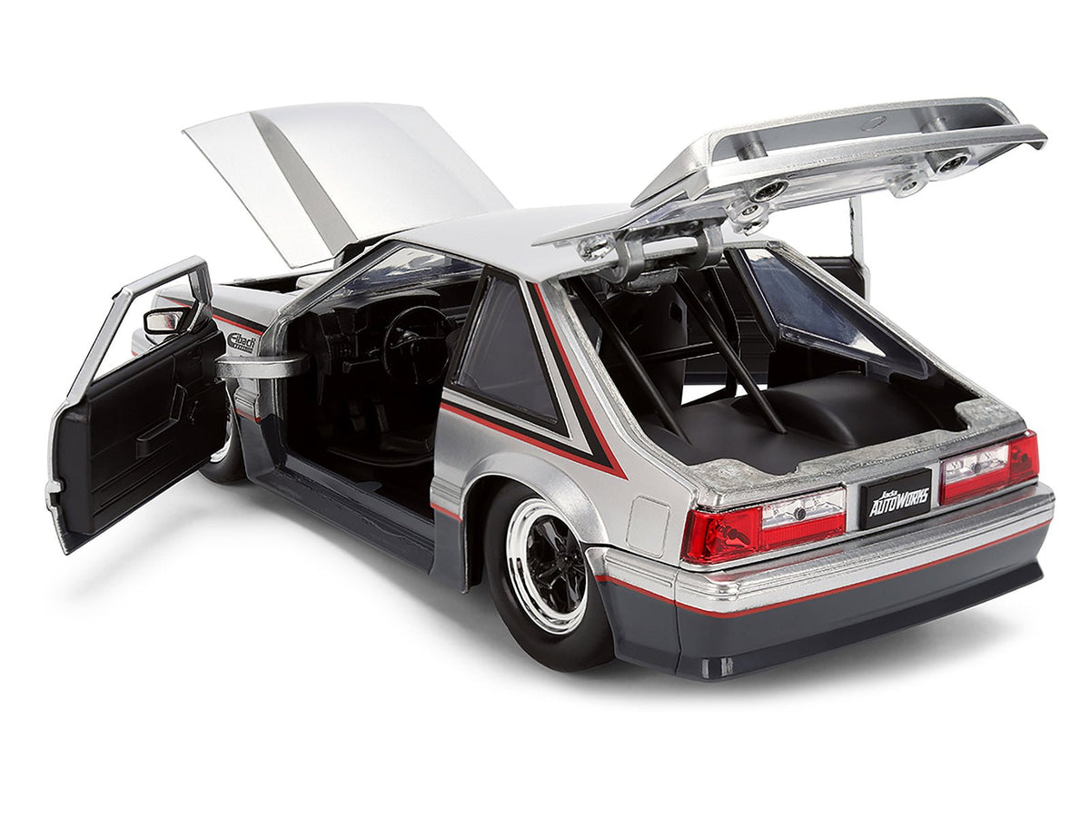1989 Ford Mustang GT Silver Metallic and Gray with Black and Red Stripes "AutoWorks" Series 1/24 Diecast Car Model by Jada-Jada-ModelCars.com