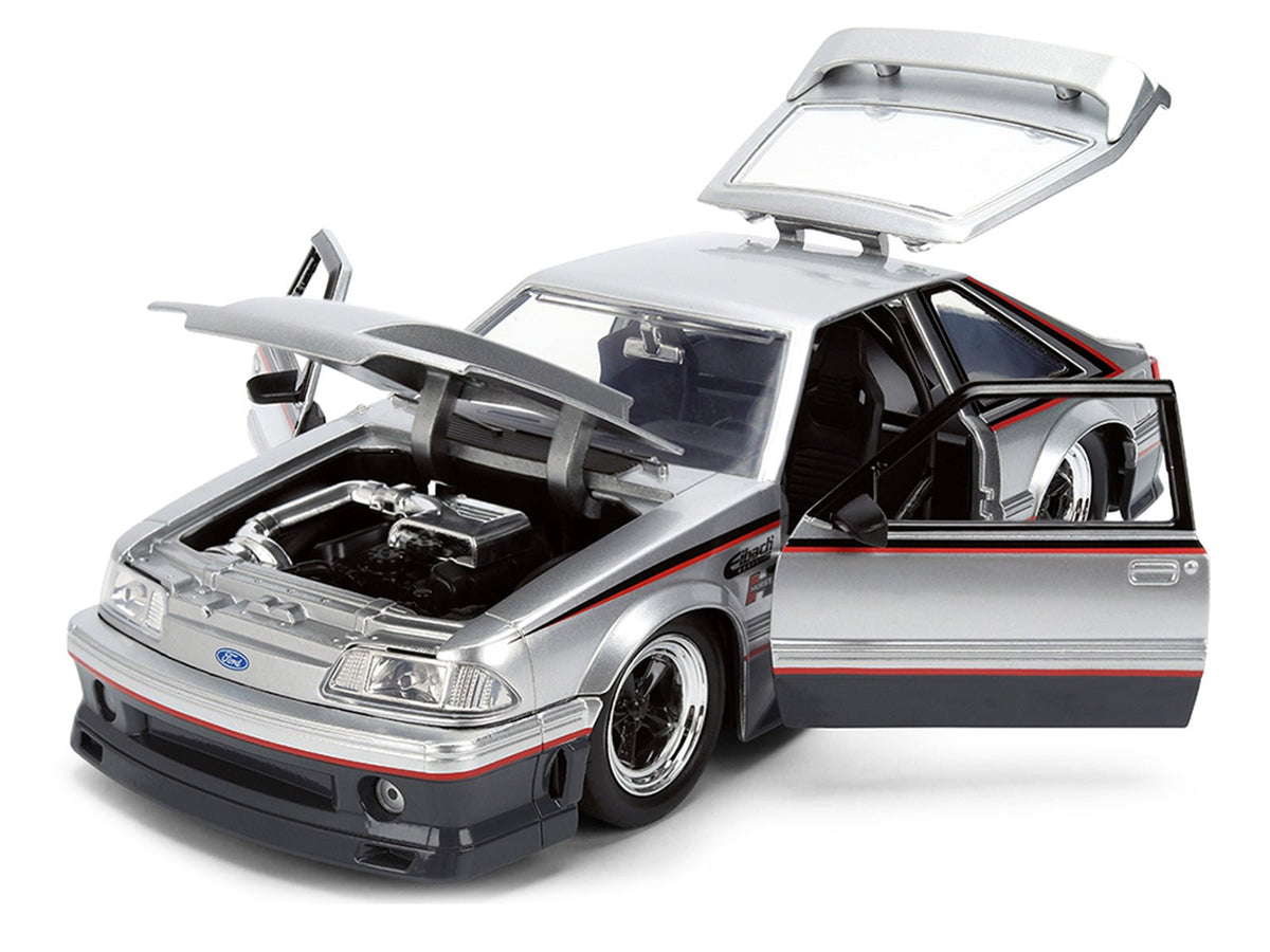 1989 Ford Mustang GT Silver Metallic and Gray with Black and Red Stripes "AutoWorks" Series 1/24 Diecast Car Model by Jada-Jada-ModelCars.com