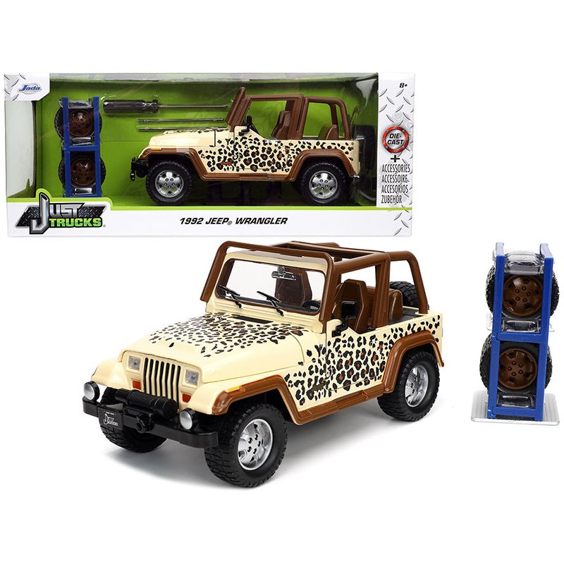 1992 Jeep Wrangler Tan and Brown with Graphics and Extra Wheels "Just Trucks" Series 1/24 Diecast Model Car by Jada-Jada-ModelCars.com