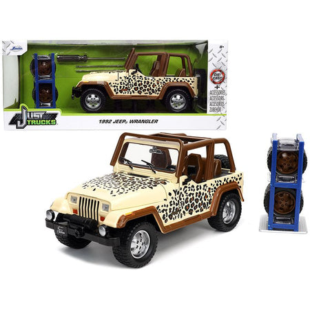 1992 Jeep Wrangler Tan and Brown with Graphics and Extra Wheels "Just Trucks" Series 1/24 Diecast Model Car by Jada - Jada - ModelCars.com