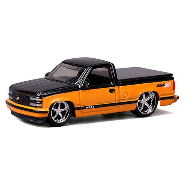 1993 Chevrolet 454 SS Pickup Truck Black and Orange Metallic "Maisto Design" Series 1/64 Diecast Model Car by Maisto - Maisto - ModelCars.com
