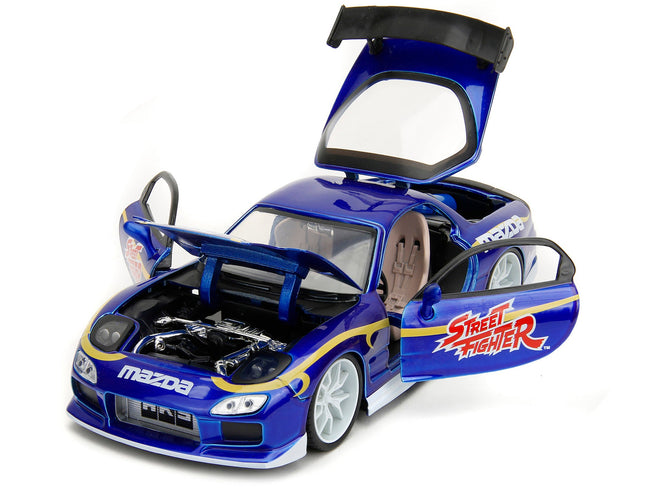 1993 Mazda RX-7 Candy Blue Metallic with Graphics and Chun-Li Diecast Figure "Street Fighter" Video Game "Anime Hollywood Rides" Series 1/24 Diecast Model Car by Jada-Jada-ModelCars.com