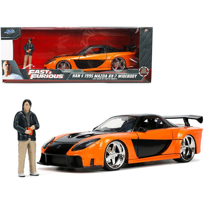 1995 Mazda RX-7 Widebody RHD (Right Hand Drive) Orange Metallic and Black with Han Diecast Figurine "The Fast and the Furious: Tokyo Drift" (2006) Movie 1/24 Diecast Model Car by Jada-Jada-ModelCars.com