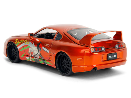 1995 Toyota Supra Orange Metallic with Graphics and Chainsaw Man Diecast Figure "Chainsaw Man" (2022) TV Series "Anime Hollywood Rides" Series 1/24 Diecast Model by Jada-Jada-ModelCars.com
