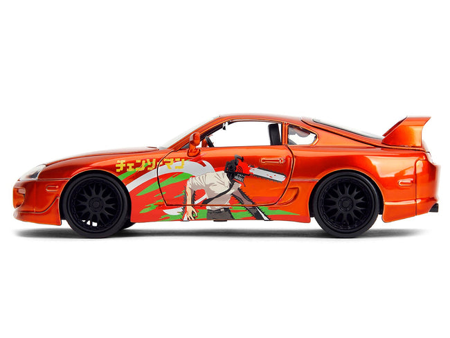 1995 Toyota Supra Orange Metallic with Graphics and Chainsaw Man Diecast Figure "Chainsaw Man" (2022) TV Series "Anime Hollywood Rides" Series 1/24 Diecast Model by Jada-Jada-ModelCars.com