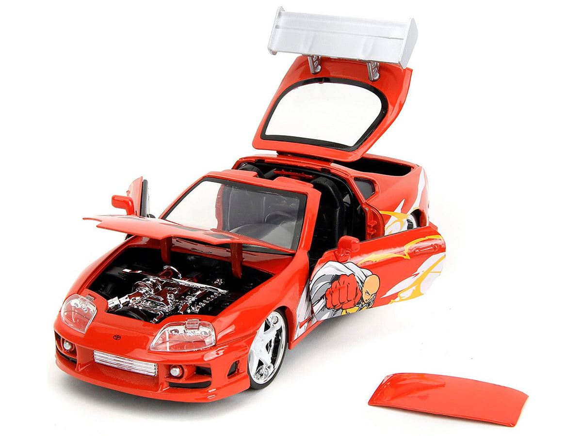 1995 Toyota Supra Red with Graphics and Saitama Diecast Figure "One Punch Man" (2015-2019) TV Series 1/24 Diecast Model by Jada-Jada-ModelCars.com