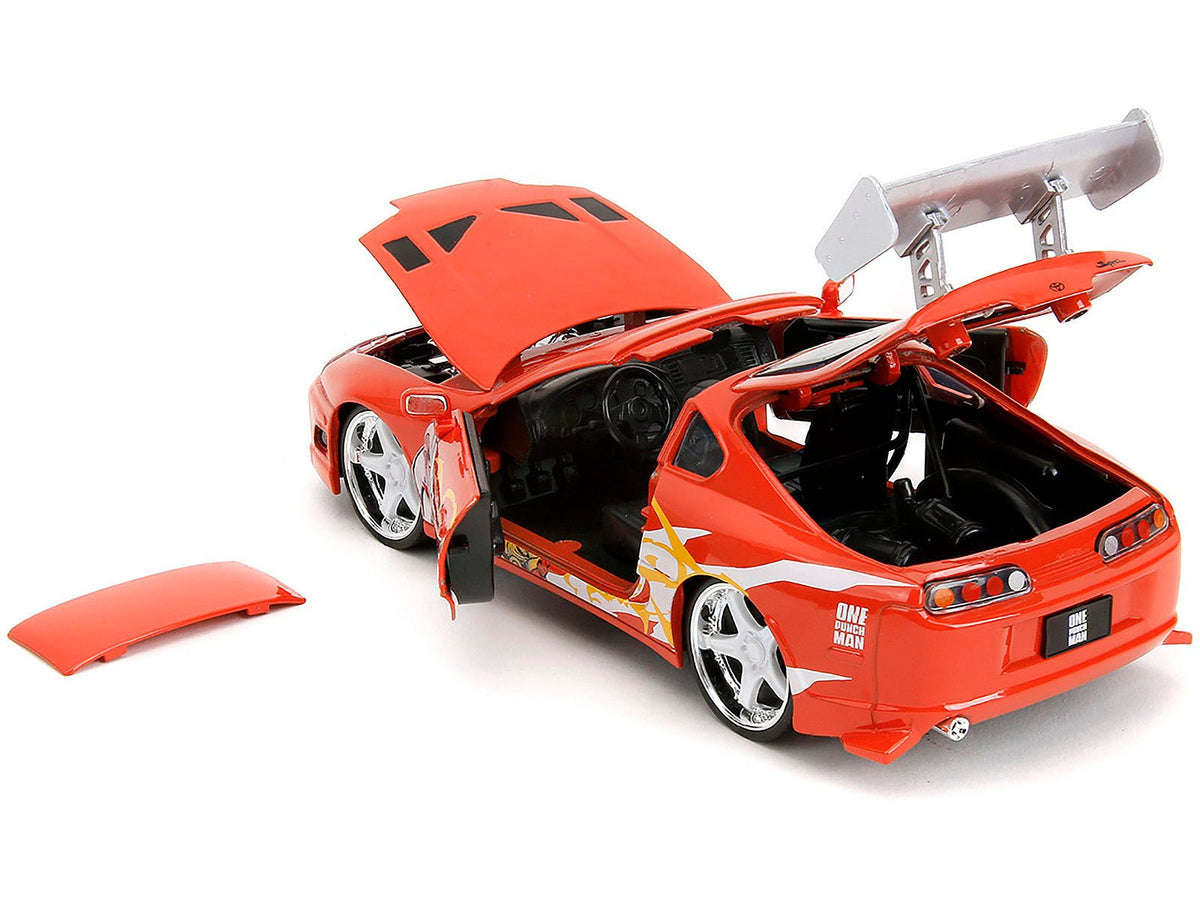 1995 Toyota Supra Red with Graphics and Saitama Diecast Figure "One Punch Man" (2015-2019) TV Series 1/24 Diecast Model by Jada-Jada-ModelCars.com