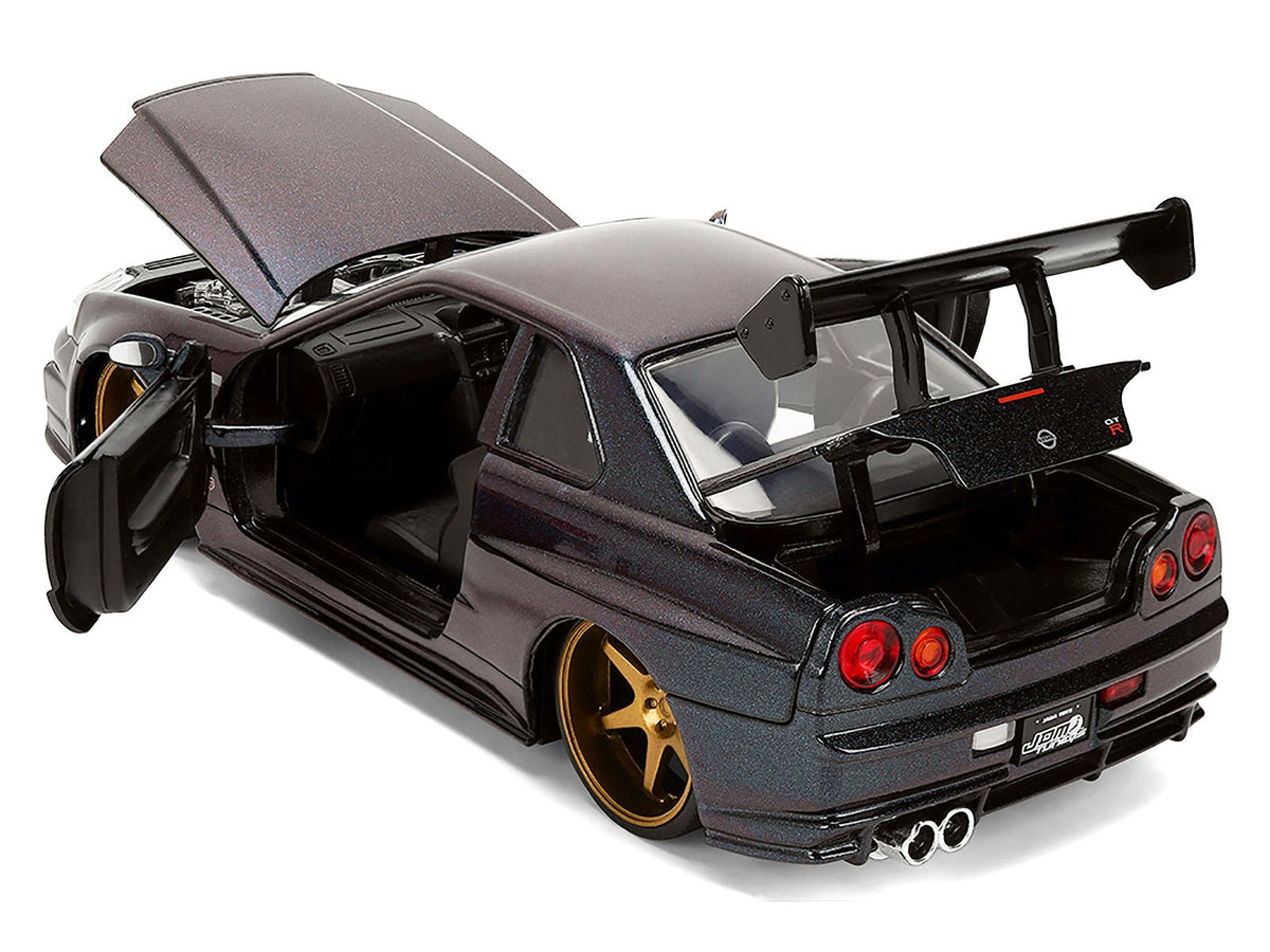 1999 Nissan Skyline GT-R (R34) RHD (Right Hand Drive) Magic Purple Metallic "JDM Tuners" Series 1/24 Diecast Car Model by Jada-Jada-ModelCars.com
