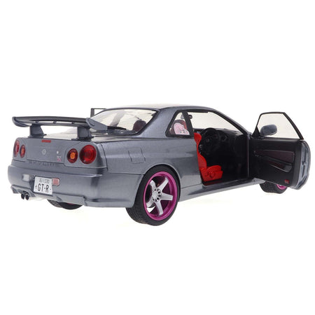 1999 Nissan Skyline GT-R (R34) RHD (Right Hand Drive) Silver Metallic with Purple Wheels 1/18 Diecast Model Car by Solido-Solido-ModelCars.com