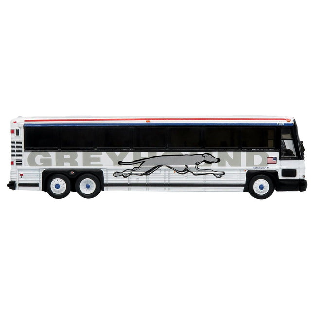 2001 MCI D4000 Coach Bus "Greyhound" White with Red and Blue Stripes "Vintage Bus & Motorcoach Collection" Limited Edition to 504 pieces Worldwide 1/87 (HO) Diecast Model by Iconic Replicas-Iconic Replicas-ModelCars.com