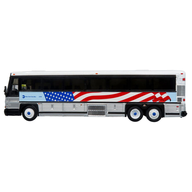 2001 MCI D4000 Coach Bus "MTA New York City - 9/11 Memorial" Silver and White with American Flag Graphics "Vintage Bus & Motorcoach Collection" Limited Edition to 504 pieces Worldwide 1/87 (HO) Diecast Model by Iconic Replicas - Iconic Replicas - ModelCars.com