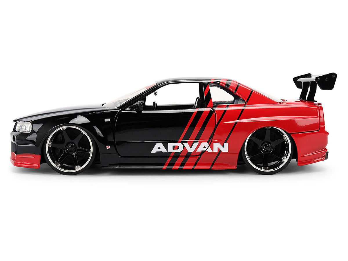 2002 Nissan Skyline GT-R (R34) RHD (Right Hand Drive) "ADVAN" Black and Red "AutoWorks" Series 1/24 Diecast Car Model by Jada-Jada-ModelCars.com