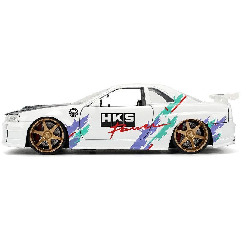 2002 Nissan Skyline GT-R (R34) RHD (Right Hand Drive) "HKS Power" White with Carbon Hood and Graphics "JDM Tuners" Series 1/24 Diecast Model Car by Jada-Jada-ModelCars.com