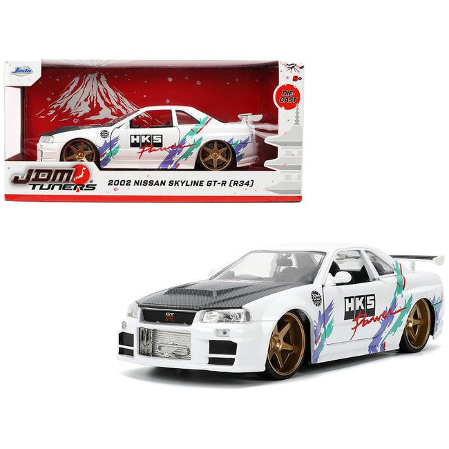 2002 Nissan Skyline GT - R (R34) RHD (Right Hand Drive) "HKS Power" White with Carbon Hood and Graphics "JDM Tuners" Series 1/24 Diecast Model Car by Jada - Jada - ModelCars.com