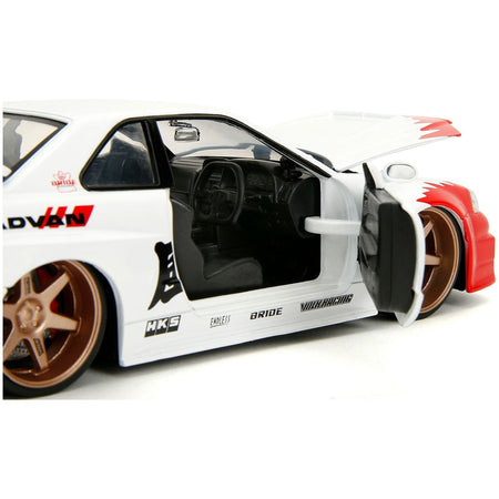 2002 Nissan Skyline GT-R (R34) RHD (Right Hand Drive) White with Red Graphics and Ryu Diecast Figure "Street Fighter" Video Game "Anime Hollywood Rides" Series 1/24 Diecast Model Car by Jada-Jada-ModelCars.com