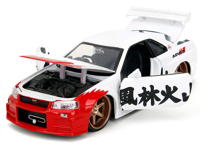 2002 Nissan Skyline GT-R (R34) RHD (Right Hand Drive) White with Red Graphics and Ryu Diecast Figure "Street Fighter" Video Game "Anime Hollywood Rides" Series 1/24 Diecast Model Car by Jada-Jada-ModelCars.com