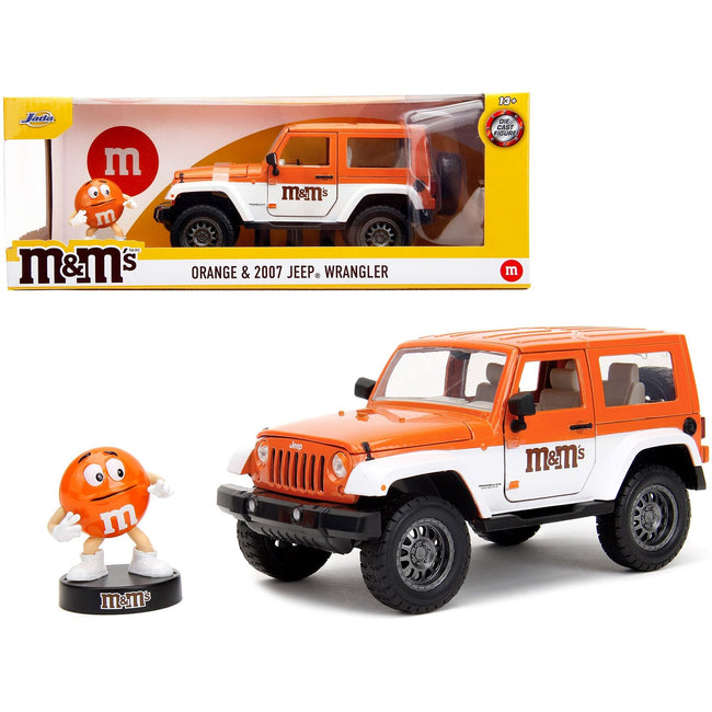 2007 Jeep Wrangler Orange Metallic and White and Orange M&M Diecast Figure "M&M's" "Hollywood Rides" Series 1/24 Diecast Model Car by Jada-Jada-ModelCars.com