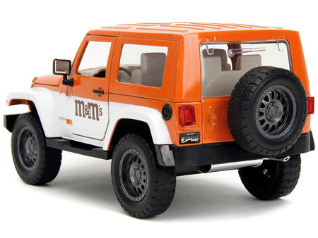 2007 Jeep Wrangler Orange Metallic and White and Orange M&M Diecast Figure "M&M's" "Hollywood Rides" Series 1/24 Diecast Model Car by Jada-Jada-ModelCars.com