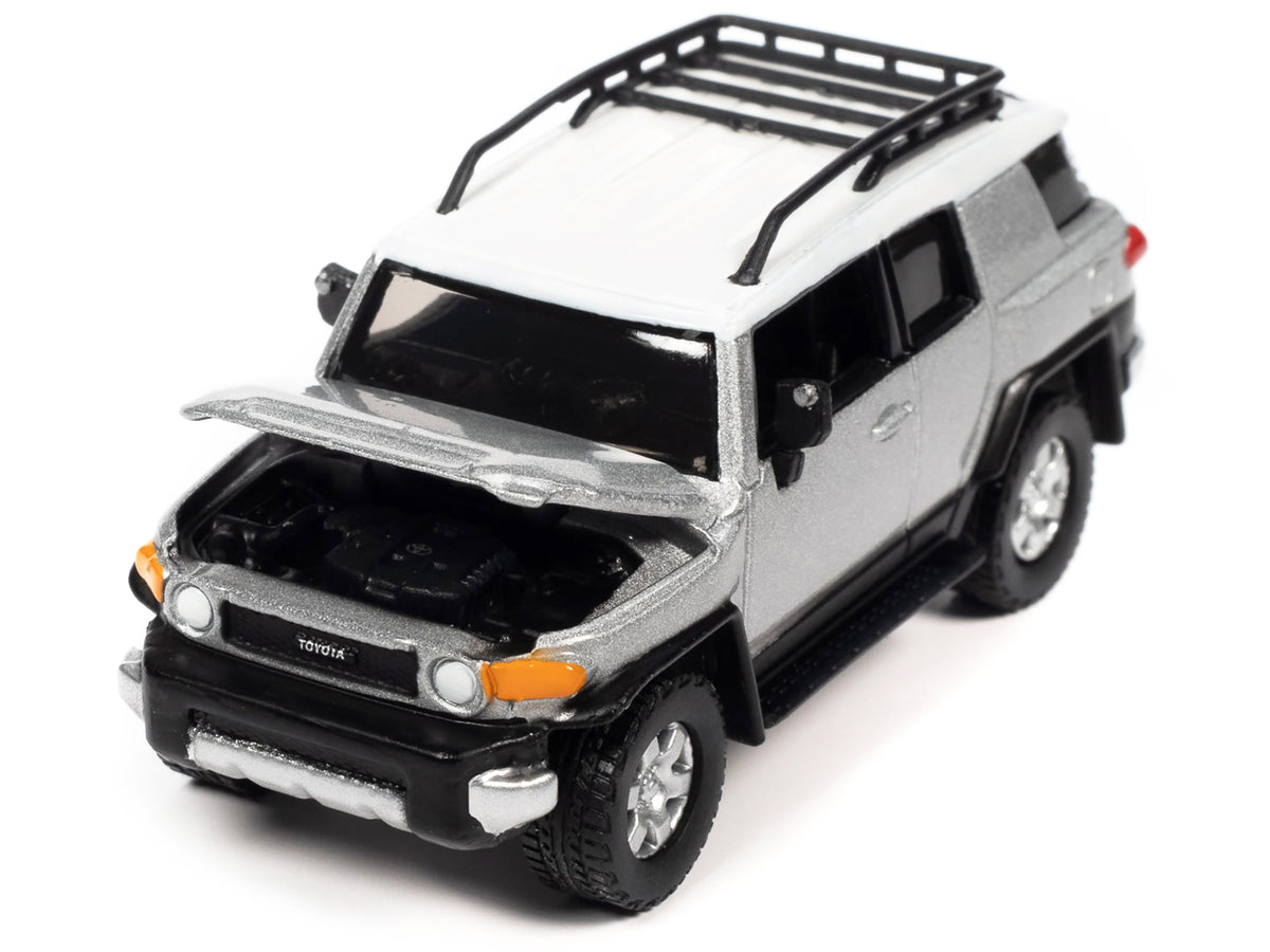 2007 Toyota FJ Cruiser Titanium Silver Metallic with White Top and Roofrack "Classic Gold Collection" Series Limited Edition 1/64 Diecast Model Car by Johnny Lightning-Johnny Lightning-ModelCars.com