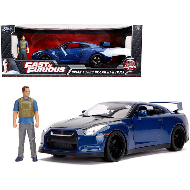 2009 Nissan GT-R (R35) Blue Metallic and Carbon with Lights and Brian Figurine "Fast & Furious" Movie 1/18 Diecast Model Car by Jada-Jada-ModelCars.com