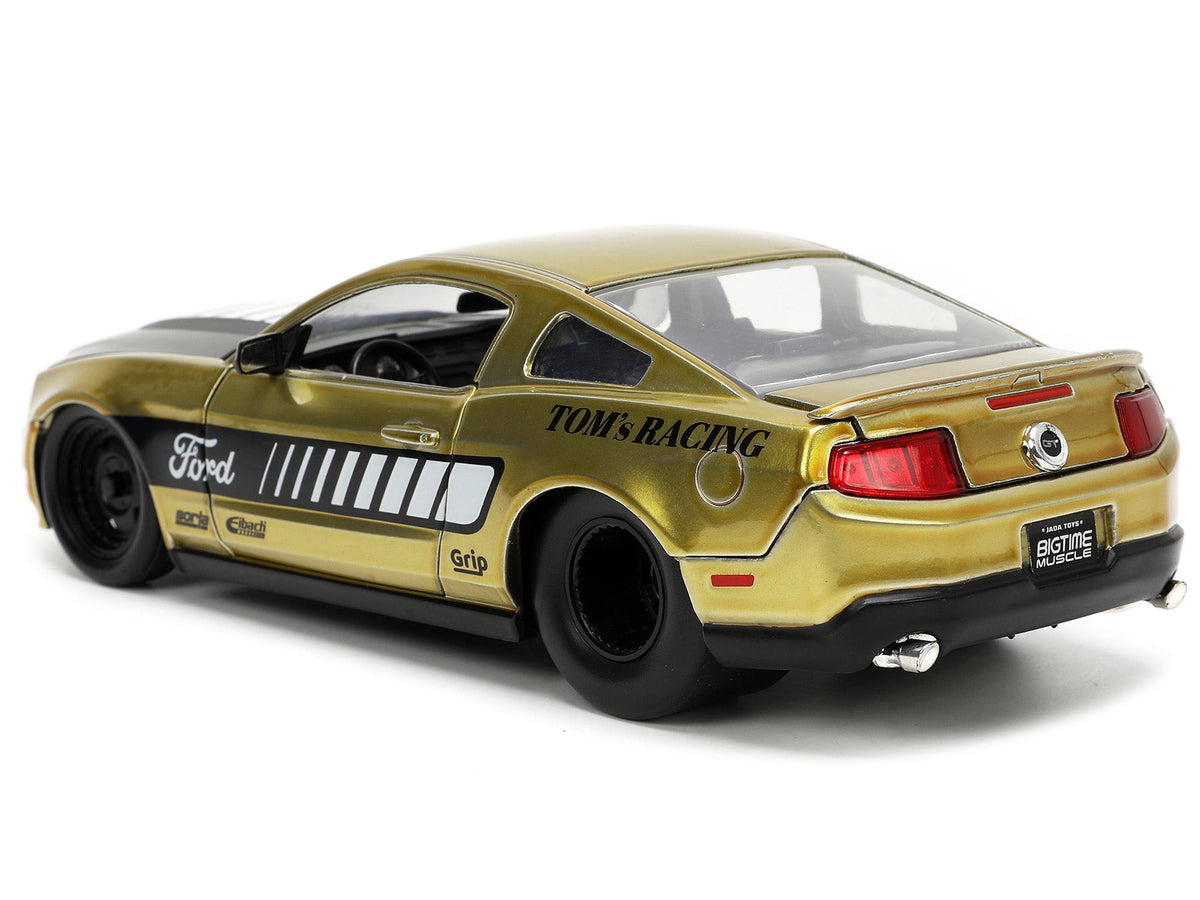 2010 Ford Mustang GT Gold Metallic with Black Graphics and Hood "Tom's Racing" "Bigtime Muscle" Series 1/24 Diecast Model Car by Jada-Jada-ModelCars.com