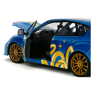 2012 Subaru Impreza WRX STI Blue Metallic with Graphics and Sonic The Hedgehog Diecast Figure "Sonic The Hedgehog" "Hollywood Rides" Series 1/24 Diecast Model Car by Jada