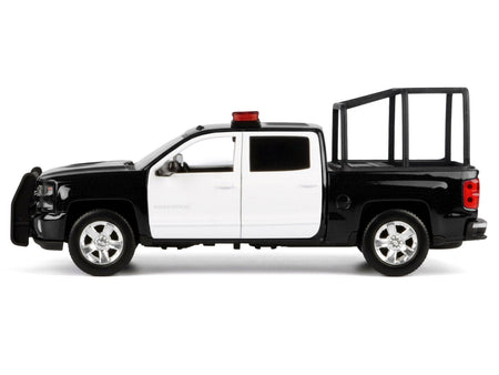 2017 Chevrolet Silverado 1500 LT Z71 Crew Cab Pickup Truck with Bed Cage Black and White with Flashing Light Bar and Front and Rear Lights and Sounds 1/27 Diecast Model Car by Motormax-Motormax-ModelCars.com